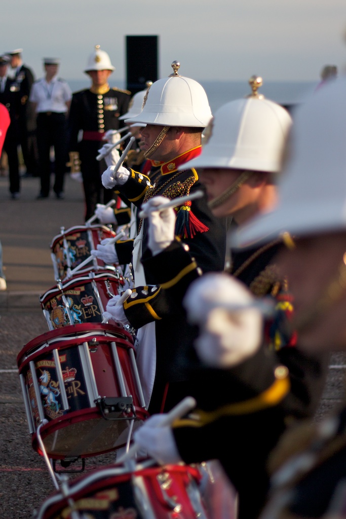 I have no idea why the drummers always hold the sticks up to their noses like that. Do they have an itch?