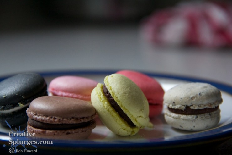 close up of colourful macaroons on a plate